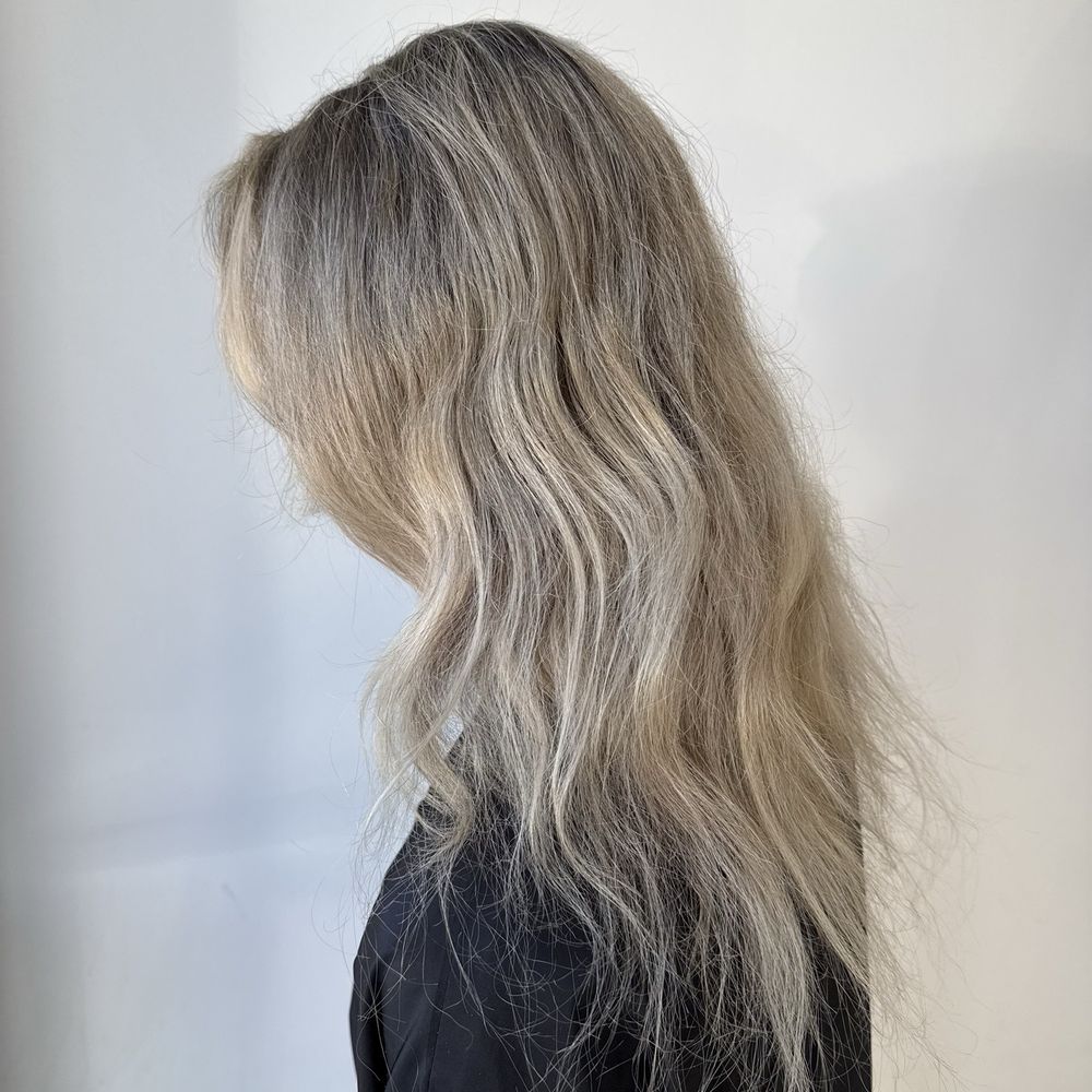 Mayte Varnam, founder of MAYTE'S BEAUTY SALON, providing expert hair extension services in Costa Mesa